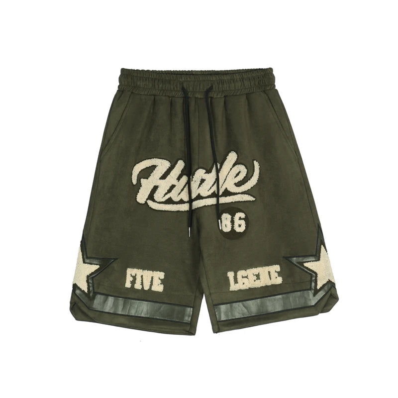 Green shorts with white text on a white background