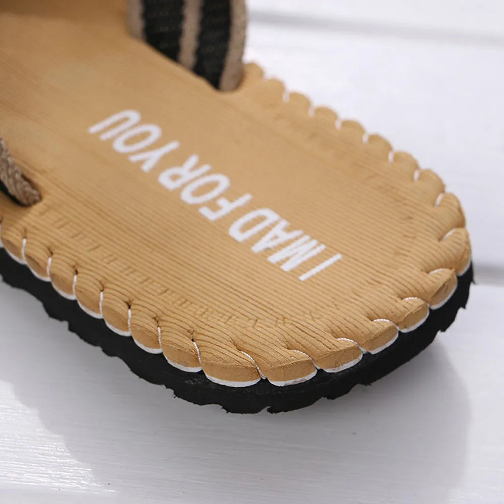 Close-up of a sandal with 'MADE FOR YOU' text on a white background