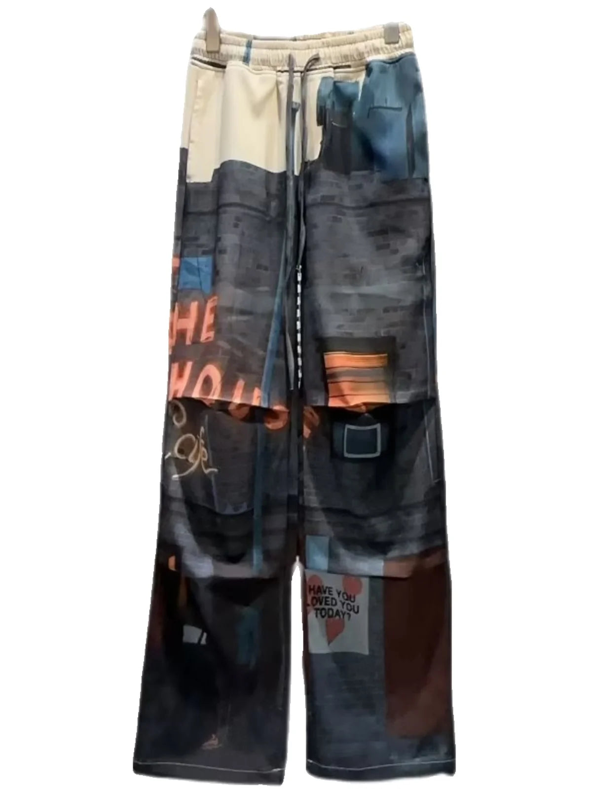 Multicolored pants with text and patterns on a white background