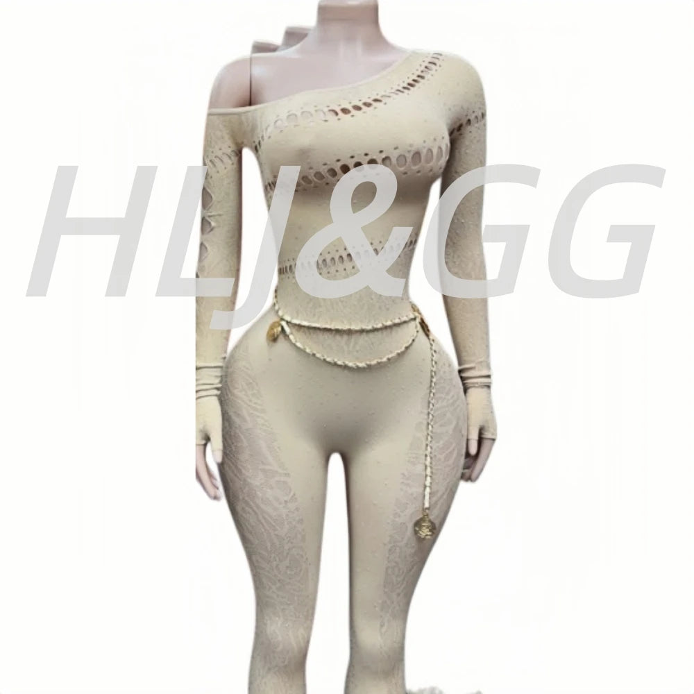 HLJ&GG Sexy funkelnder Strass Hohl Bodycon Einteiler Jumpsuits Damen One Shoulder Langarm Slim Playsuit mit Kette 2025