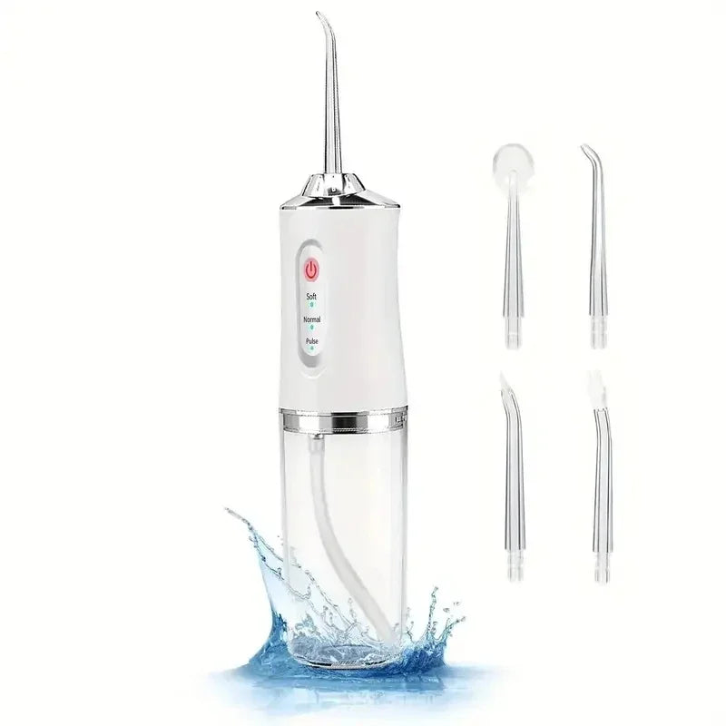 White dental water flosser with additional nozzles on a white background