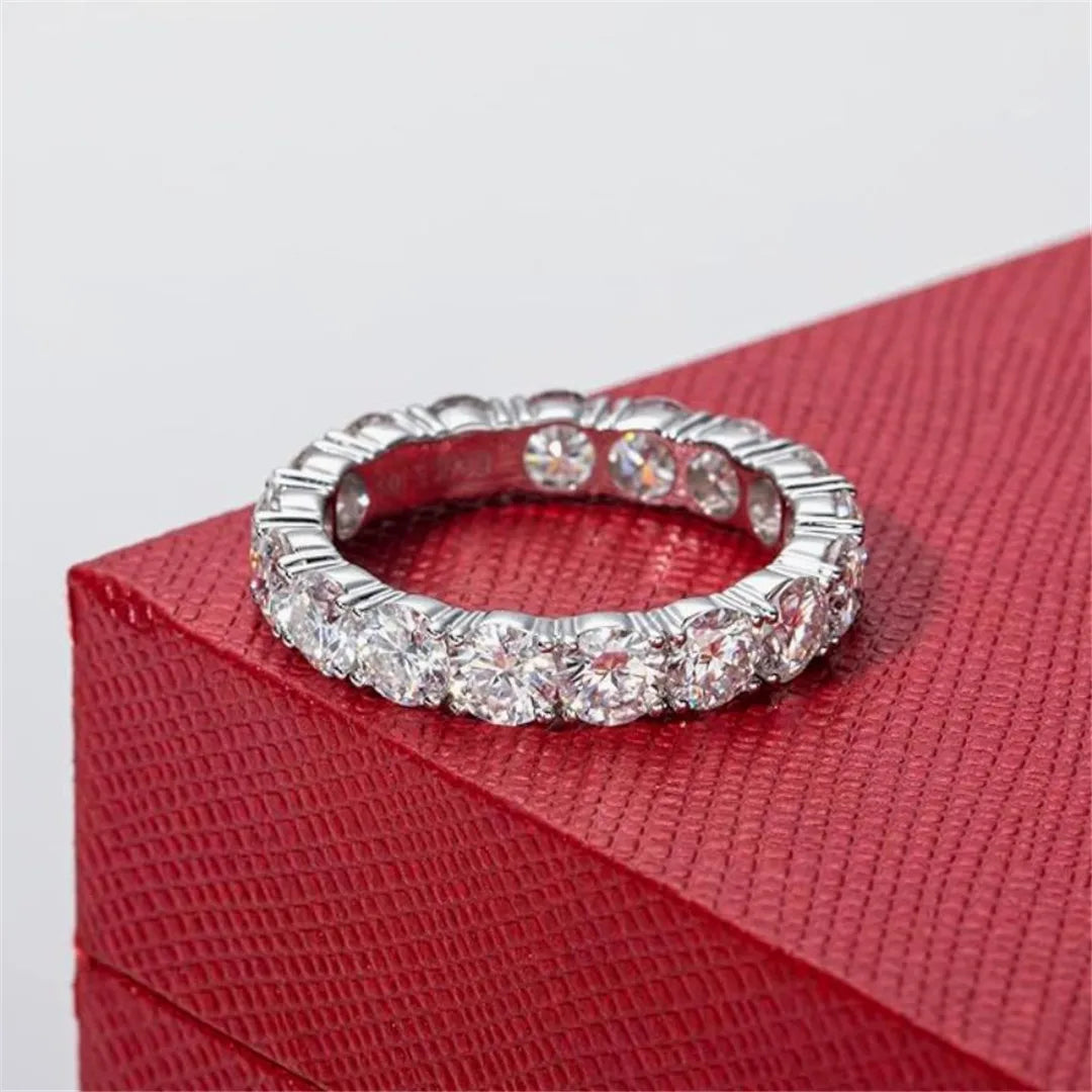 Silver ring with diamonds on a red box