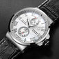 Luxury wristwatch with a detailed face and black leather strap on a dark background