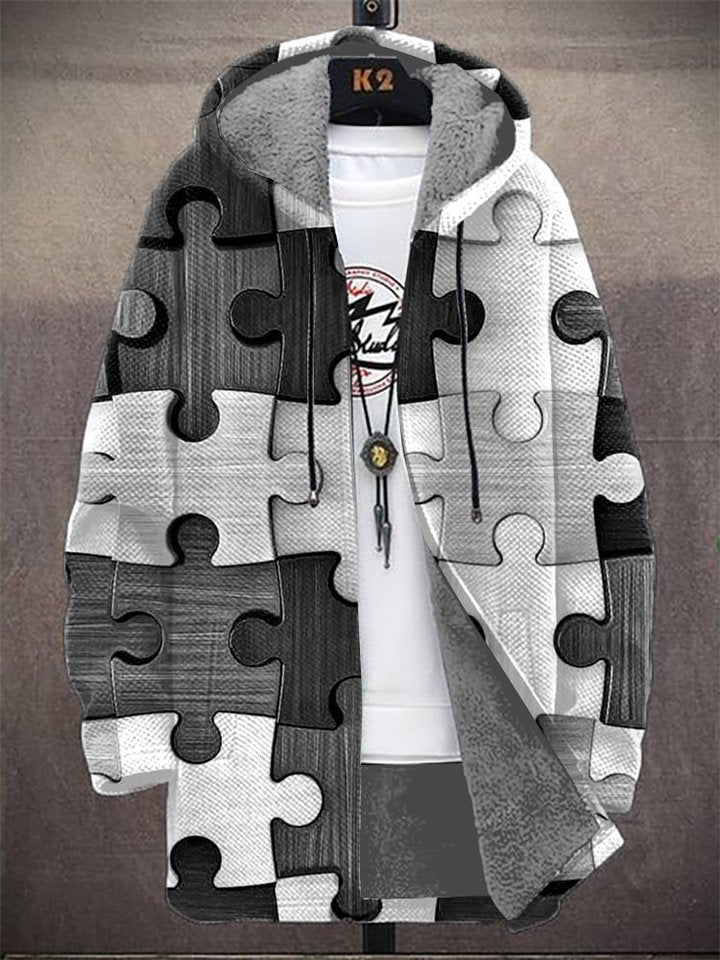 Hoodie with puzzle piece design on a plain background