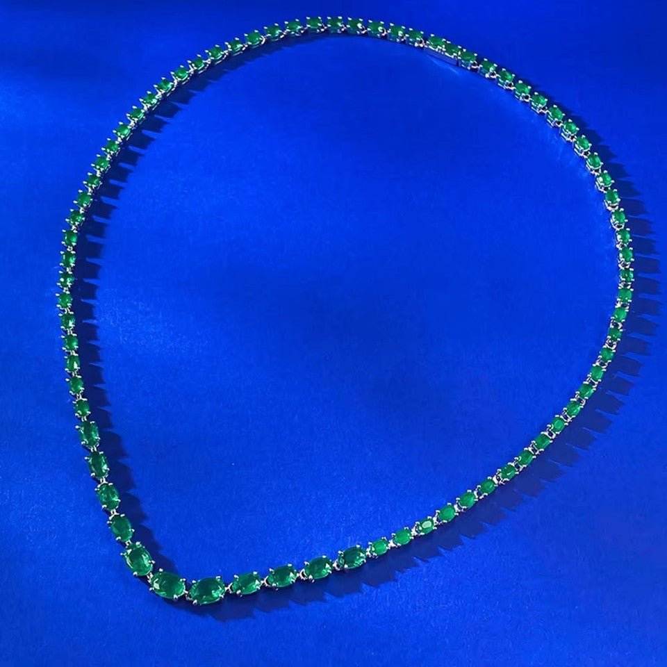 925 Sterling Silver Oval Cut Emerald Tennis Necklace close-up showing graduated emerald stones