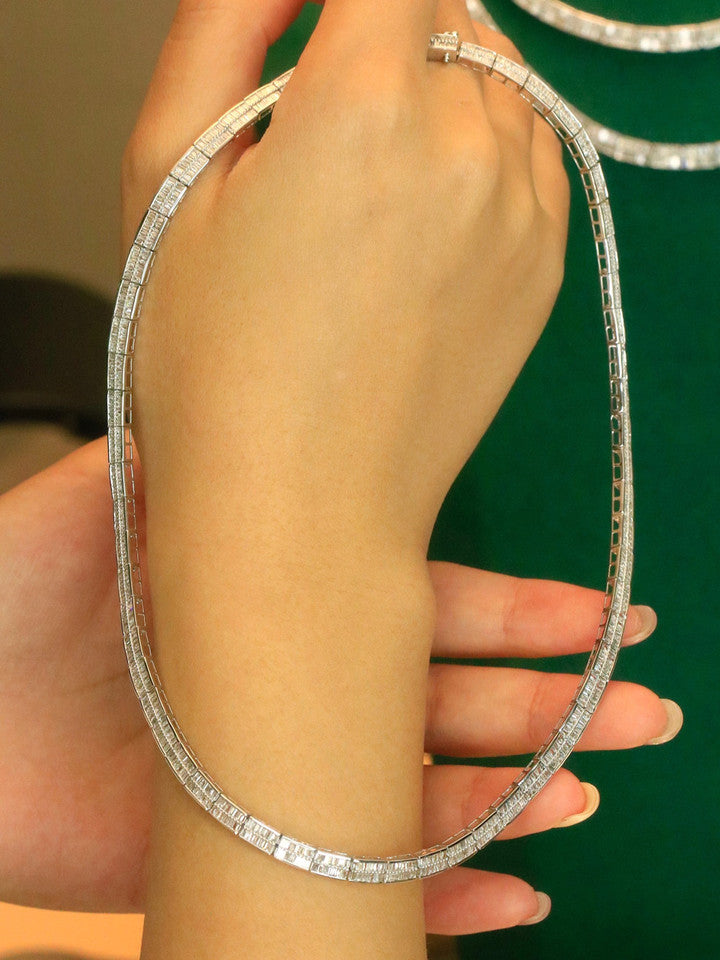 UBESTNICE 18K White Gold Diamond Choker Necklace coiled on green jewelry case