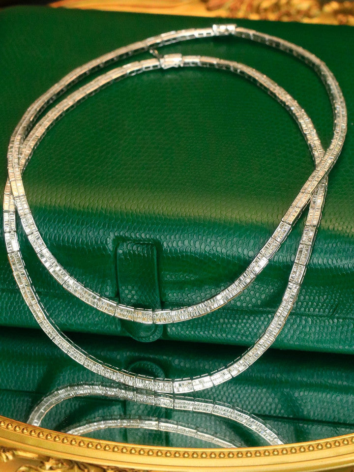 UBESTNICE 18K White Gold Diamond Choker Necklace draped over hand showing flexibility