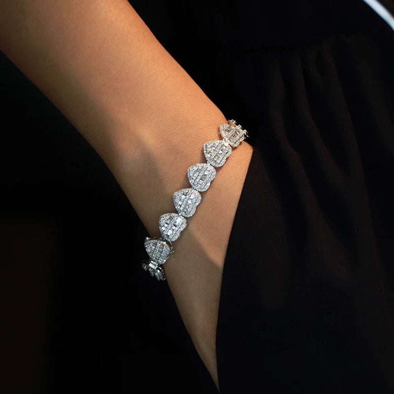 18K White Gold Heart Baguette Diamond Bracelet draped over hand - front view