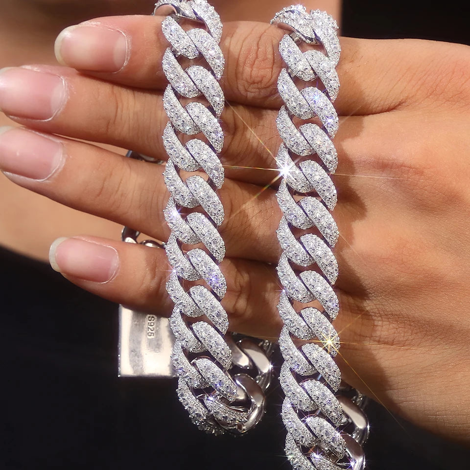 Iced out Cuban link chain 15mm Moissanite on display bust