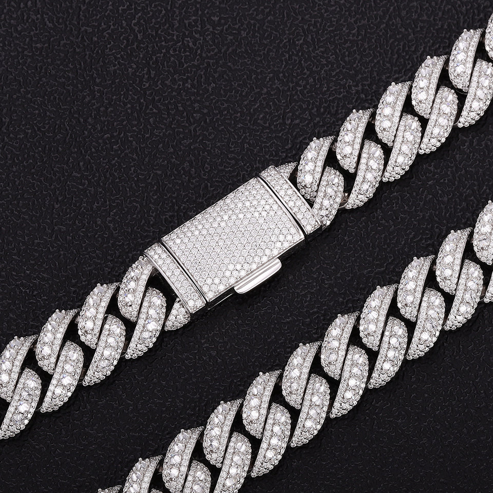 Iced out Cuban link chain coiled showing full 24 inch length