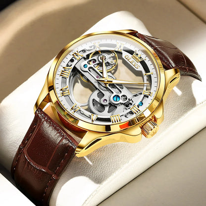 Luxury watch with gold case and brown leather strap on a light background