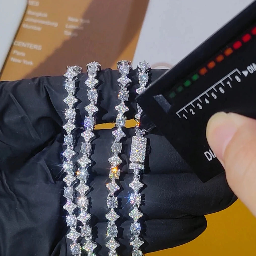 Jewelry with a diamond content tester showing the measurement.