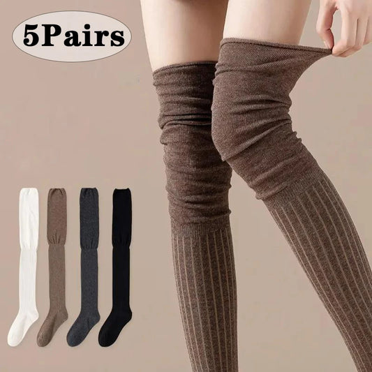 Brown knee-high socks with color swatches on a beige background