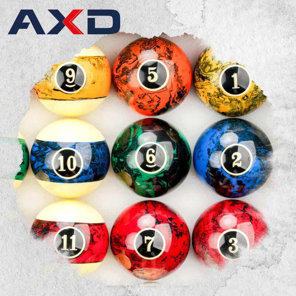 Set of colorful marbled billiard balls with numbers on a textured surface, featuring the AXD brand.