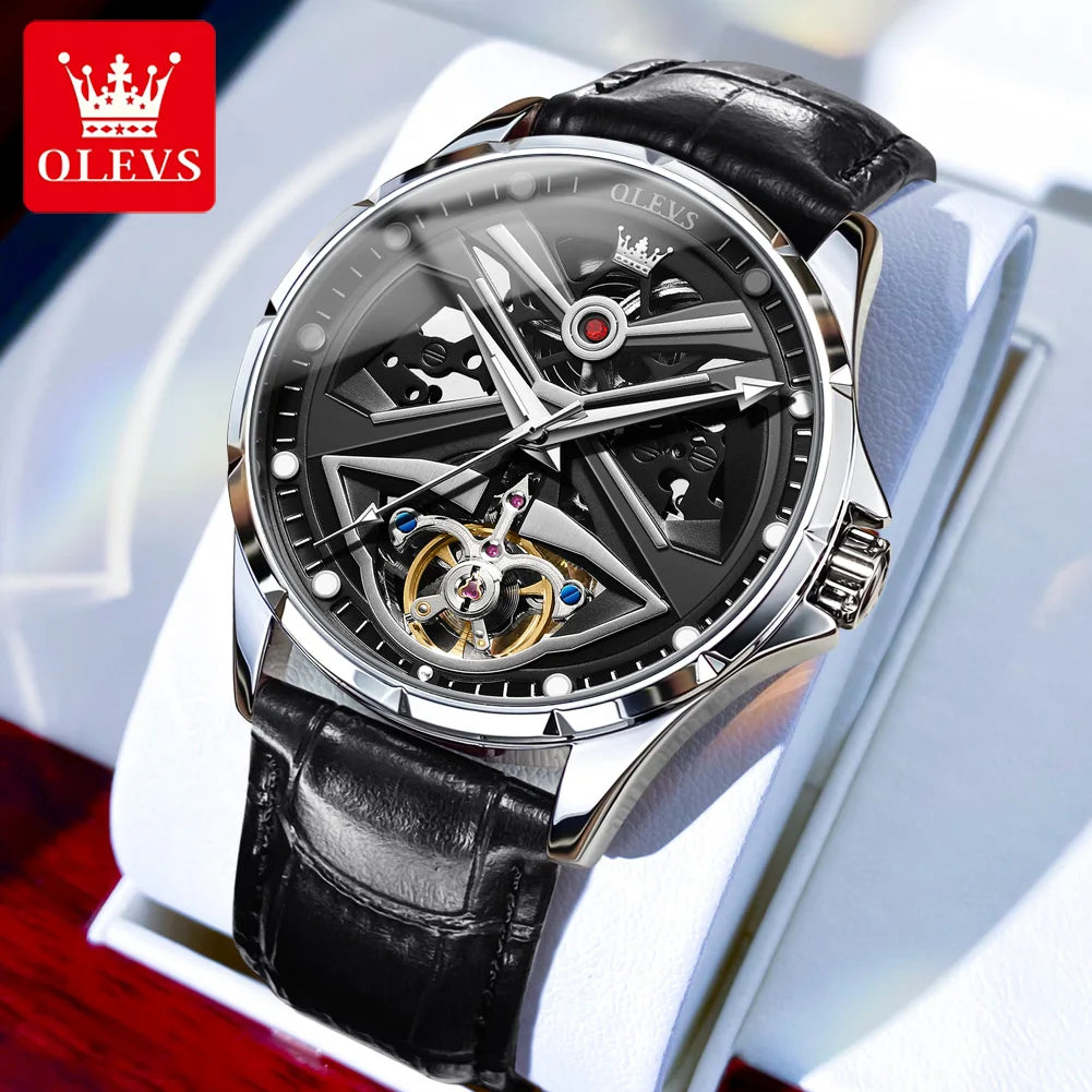 Mechanical watch with black leather strap and OLEVS branding on a white background