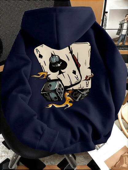 Navy blue hoodie with a graphic design of playing cards and dice on a chair.