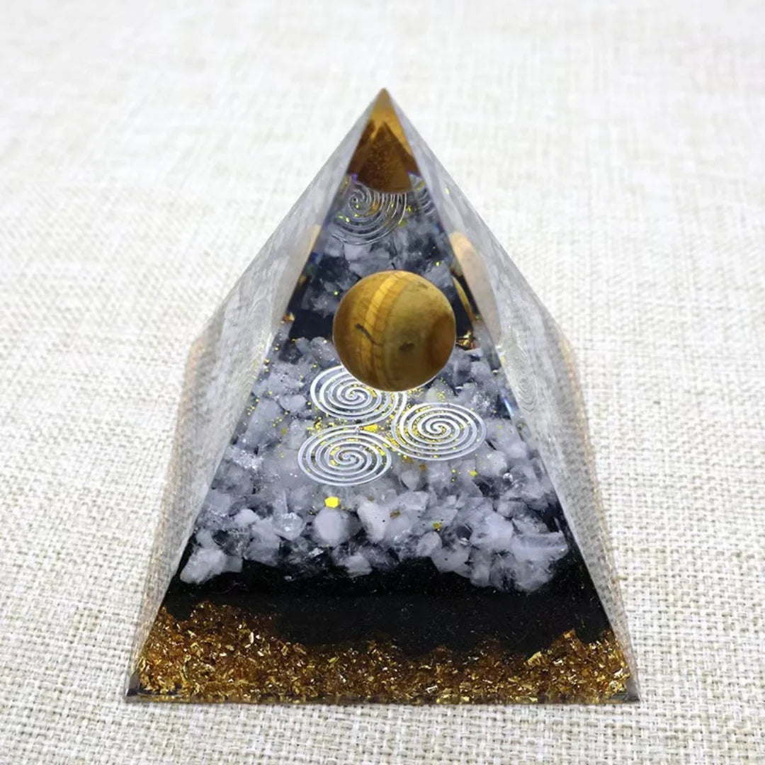 Triangular pyramid with decorative elements on a textured white background