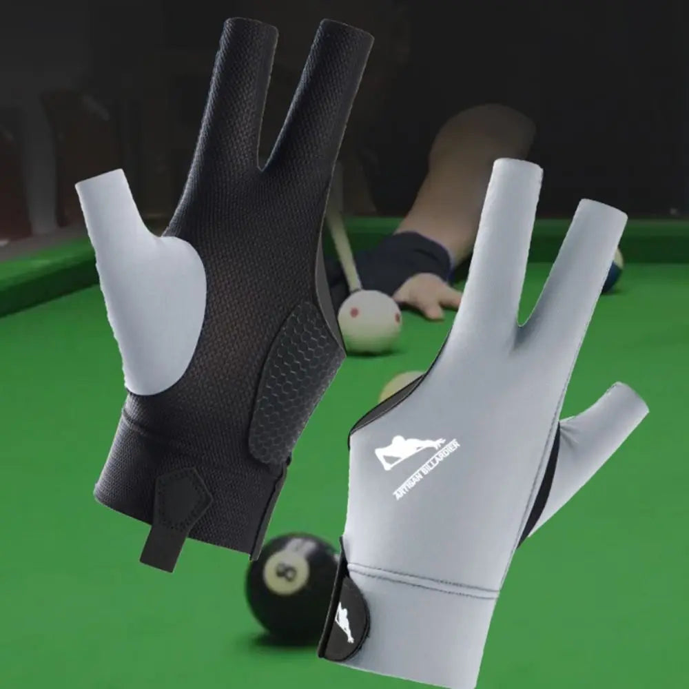Two billiard gloves on a green pool table with balls and cues in the background.