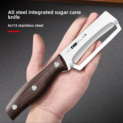 Hand holding a sugar cane knife with wooden handle and stainless steel blade, on a dark background.