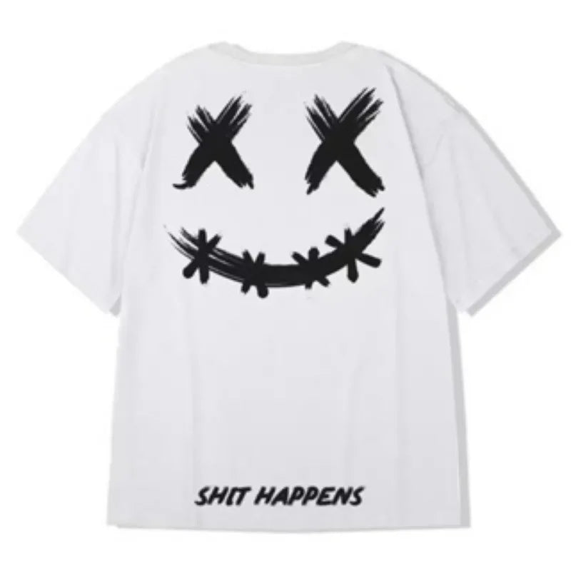 White t-shirt with black smiley face and 'SHIT HAPPENS' text on a white background