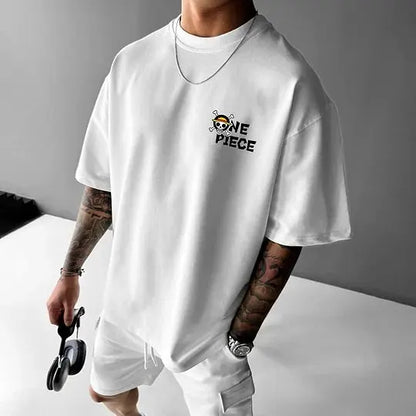 Person wearing a white t-shirt with a 'One Piece' logo on a gray background