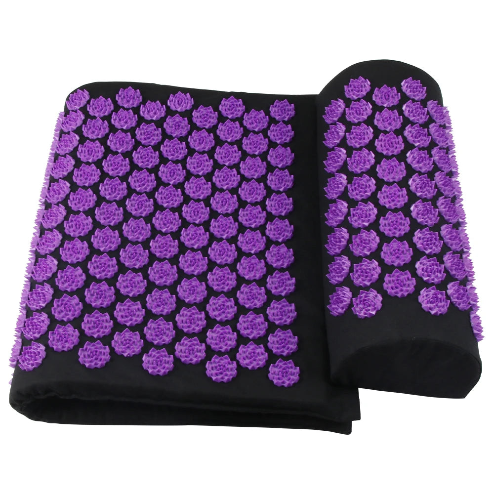 Black acupressure mat with purple凸瘩 on a white background