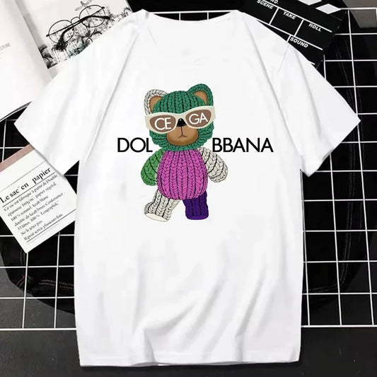 White t-shirt with a cartoon bear design and text on a black and white checkered background
