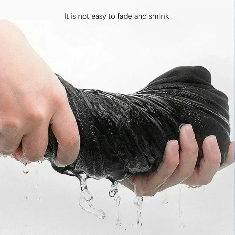Person holding a black garment under running water with text 'It is not easy to fade and shrink'.