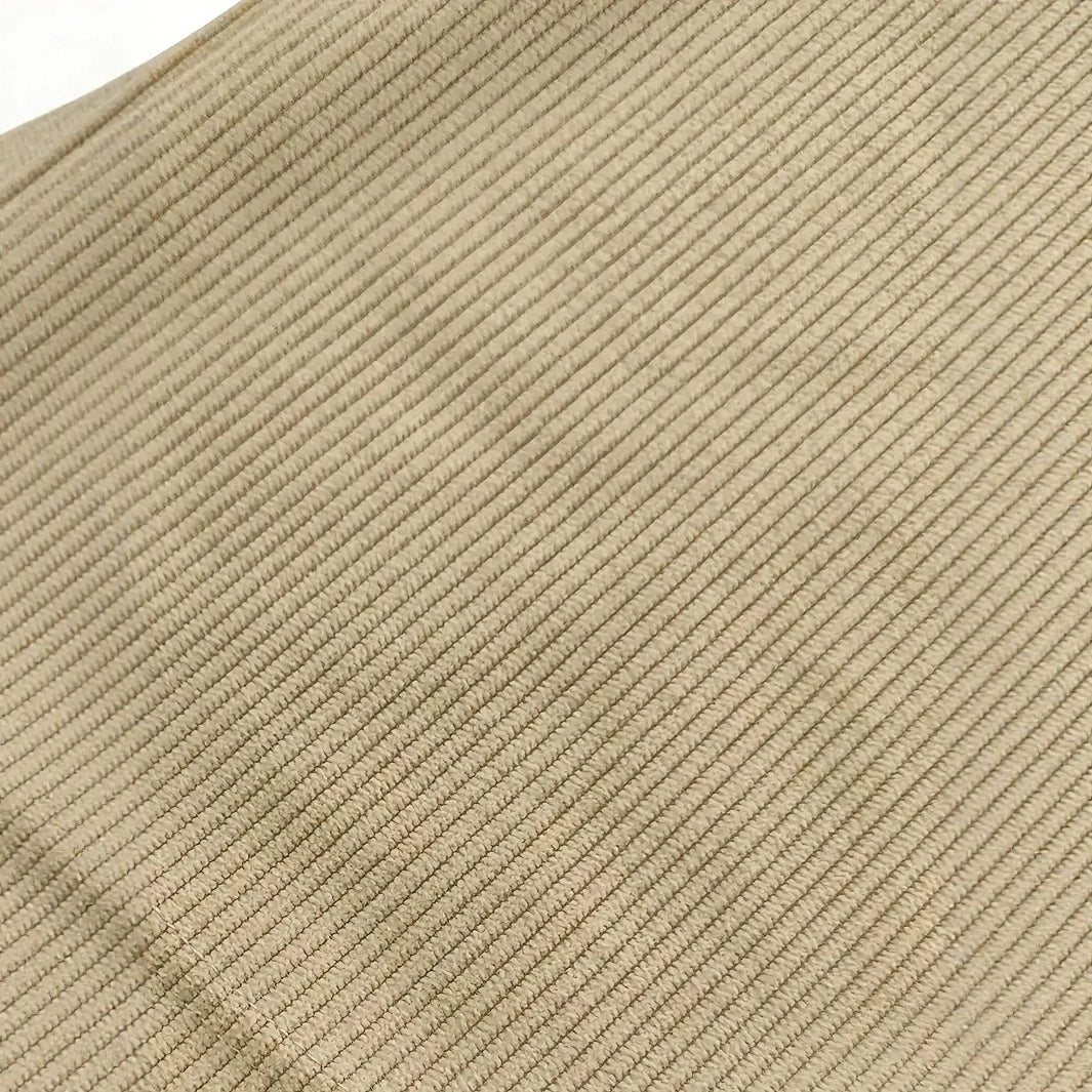 Close-up of beige fabric texture