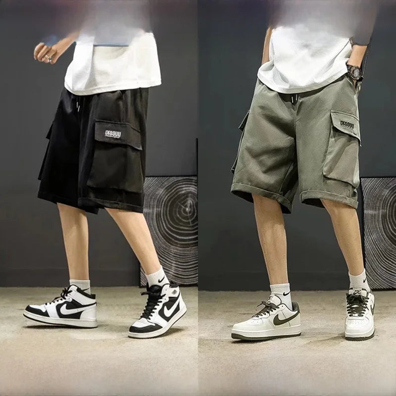 Two people wearing different cargo shorts with a neutral background