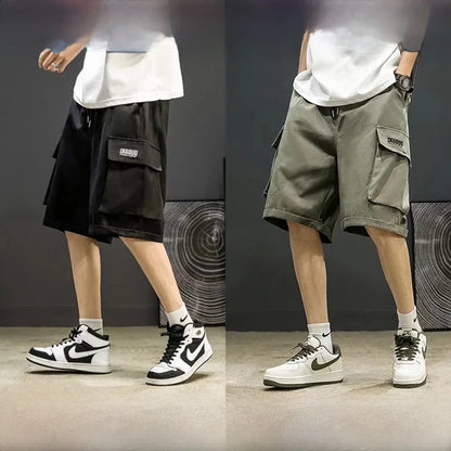Two people wearing different cargo shorts with a neutral background