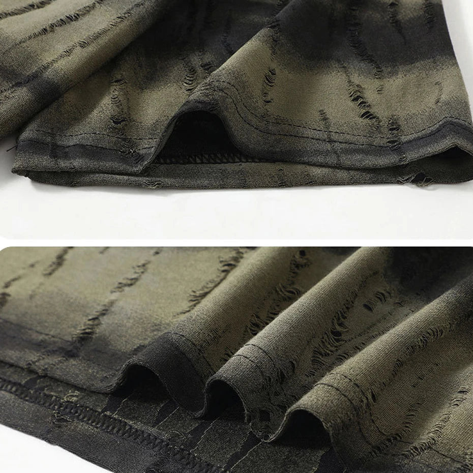 Close-up of distressed denim fabric with a white background