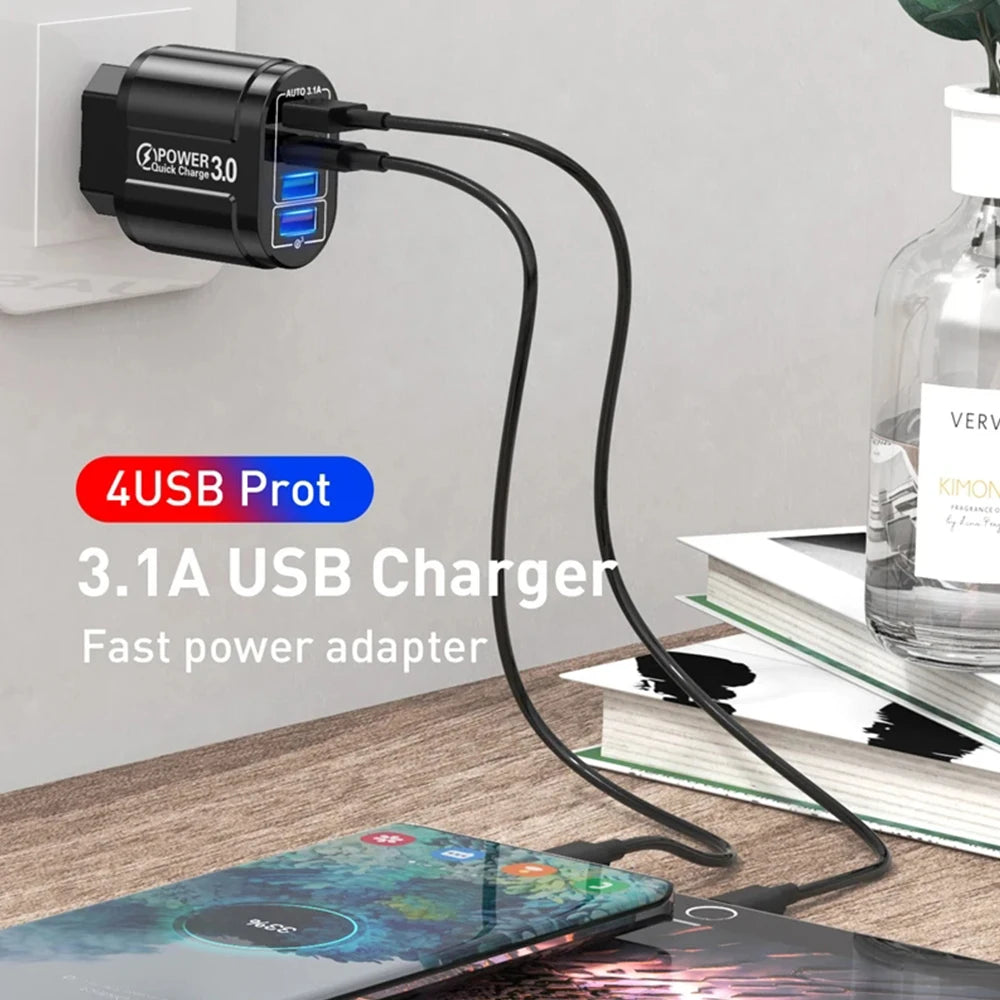4USB Port 3.1A USB Charger on a desk with a phone and books in the background