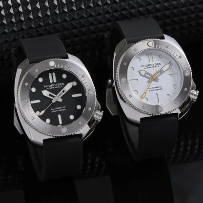 Two watches with black and silver designs on a textured black background