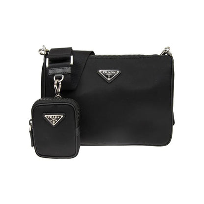 Black Prada handbag with matching pouch on a white background