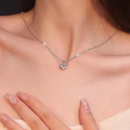 Diamond necklace on a person's neck with a blurred background