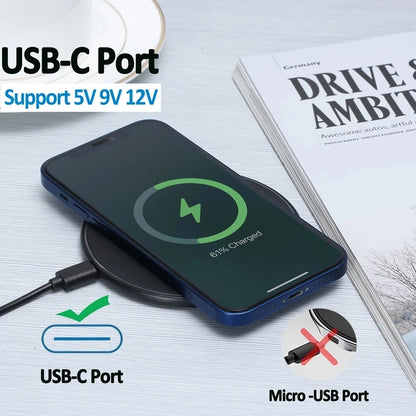 Phone with USB-C port charging on a surface with text and icons indicating compatibility.