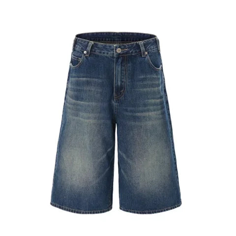 Blue denim shorts on a white background