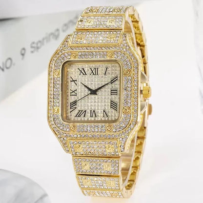 Gold watch with diamond accents on a white background