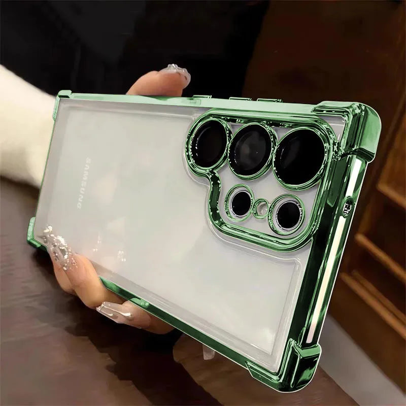 Phone case with green border held by a person on a wooden surface