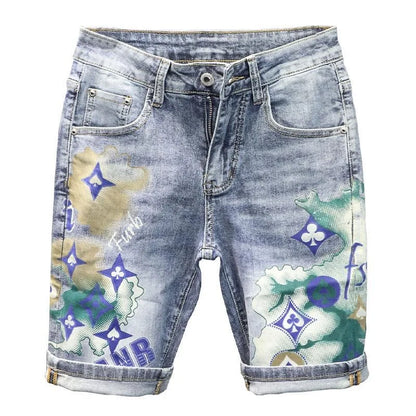 Denim shorts with colorful graphic designs on a white background