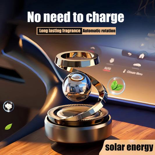 Decorative solar energy spinner on a car dashboard with text highlighting features.