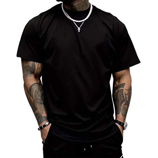 Person wearing a black t-shirt with tattoos on arms and neck.