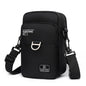 Black shoulder bag with visible brand logo on a white background
