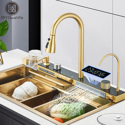 Modern kitchen sink with gold faucet and digital display, featuring MYQualife brand.