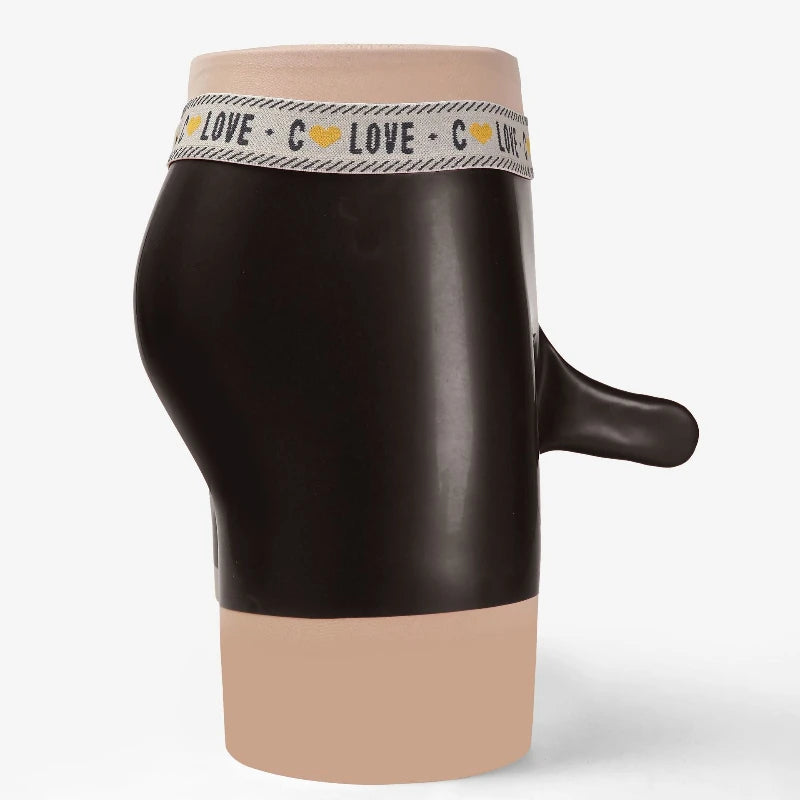 Black and beige mug with a band around the middle displaying text.