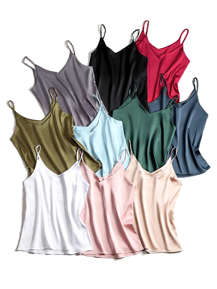 Collection of colorful camisoles on a white background