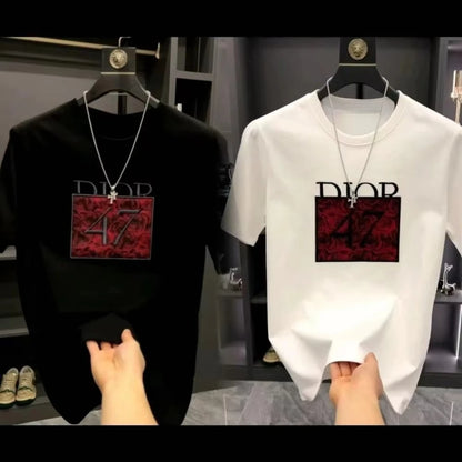 Black and white t-shirts with red and black 'Dior' logo on hangers.