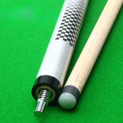 Close-up of a pool cue with checkered design on a green felt background