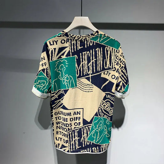 Short-sleeve shirt with graphic design on a hanger against a gray background